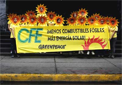 Greenpeace activists take part in a protest against the use of fossil fuels in Mexico City.