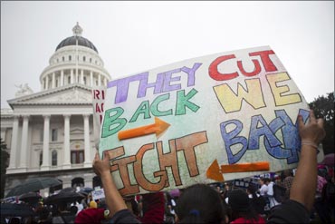 Thousands of college students and faculty protest at the State Capitol in Sacramento over balancing the budget.