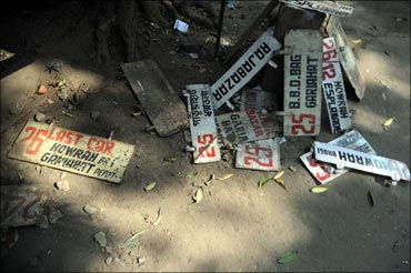 Route-boards scattered at the Gariahat tram depot.
