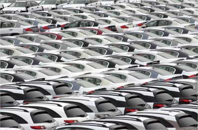 Nissan Motor vehicles which are bound for the foreign market are parked at a shipyard of the Oppama factory in Yokosuka.