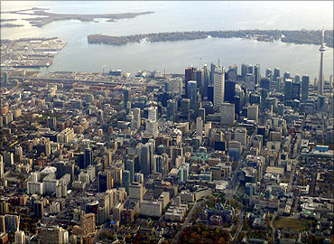 The downtown core of Toronto sits next to Lake Ontario in a picture taken from a commercial flight.
