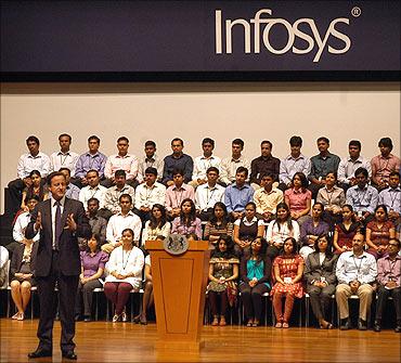 British Prime Minister David Cameron speaks during his visit at the Infosys campus.