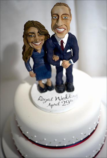 A wedding cake featuring Prince William and his fiancee Catherine Middleton.