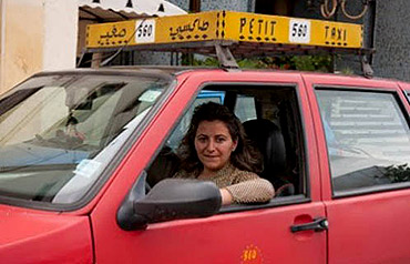 A woman taxi driver in Fez.