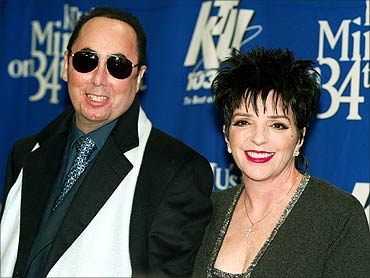 Singer Liza Minnelli and her husband David Gest pose for photographers