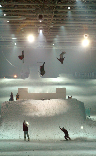 Skiers display their skills in a Madrid rink.