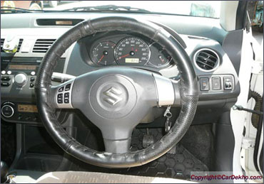 Steering wheel of Maruti Dzire.
