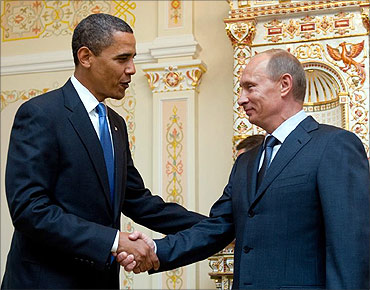 President Barack Obama with Russian PM Vladimir Putin.