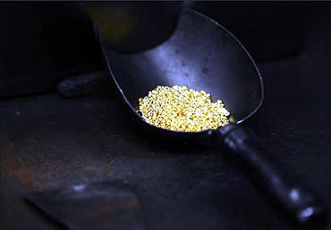A shovel with gold granules is pictured at the Austrian Gold and Silver Separating Plant, Oegussa .