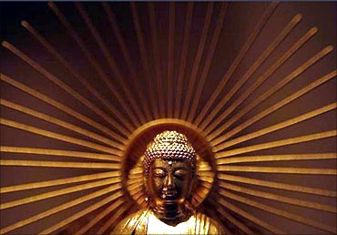 A pure gold statue of Buddha is displayed at the Ginza Tanaka store in Tokyo.