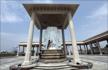 Labourers clean statues of Mayawati in Lucknow.