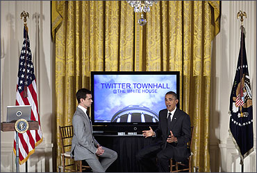 Twitter co-founder and executive chairman Jack Dorsey listens while President Barack Obama speaks.