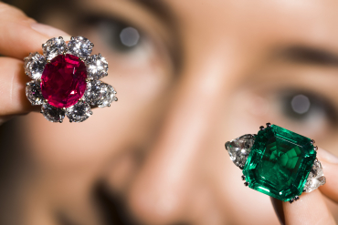 A 7.03 carat oval-shaped Burmese ruby and a 12.79 carat Colombian emerald and diamond ring in Geneva.