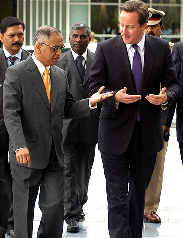 Narayana Murthy with  British Prime Minister David Cameron at the Infosys campus in Bangalore.