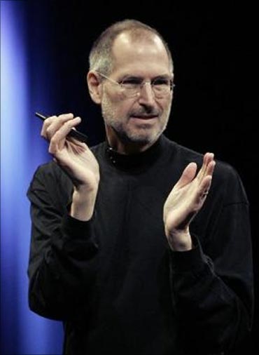 Steve Jobs appears on stage during a news conference at Apple headquarters in Cupertino, California, July 16, 2010.