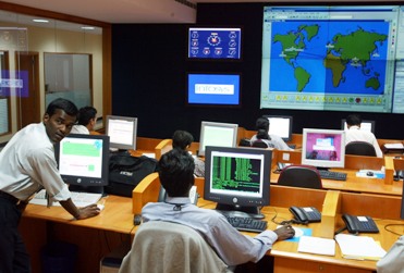 Engineers work in the control room at Infosys Technologies campus in Bengaluru.