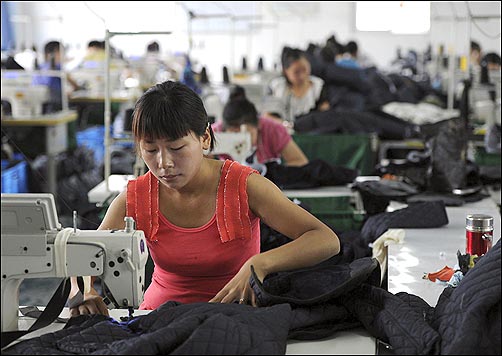 Employees work at a garment factory in Hefei.
