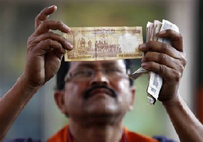 Rupee in free fall; plummets to all-time low of 52.85/$