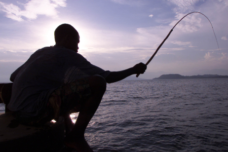 A fisherman casts his line in Lake Kivu, Goma.