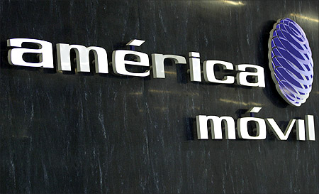 The logo of America Movil is seen on the wall of the reception area in the company's new corporate offices in Mexico.