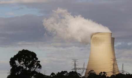 Steam raises from the cooling towers of a coal power station in Australia.
