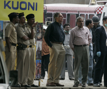 Ratan Tata with R K Krishna Kumar to his left at theTaj Mahal hotel in Mumbai after it was cleansed of terrorists, November 29, 2008