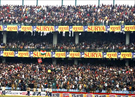 Spectators wait in the stands after the fifth one-day international cricket match between India and Sri Lanka in New Delhi.