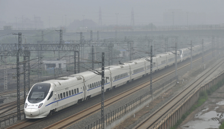 A bullet train departs from a railway station in Shenyang, China.