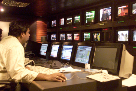 A news producer inside a studio in New Delhi.