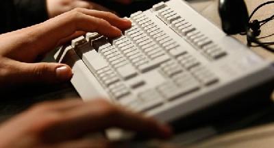 A woman working on the computer