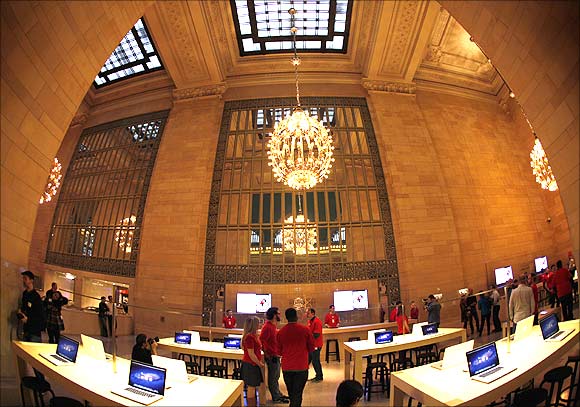 Apple laptops are seen on display inside the newest Apple Store in New York City's Grand Central Station.