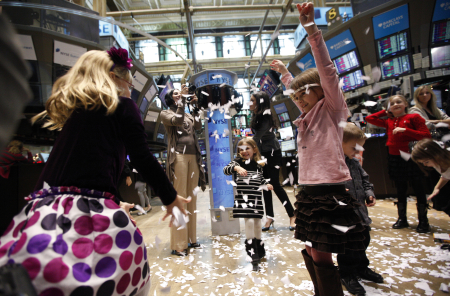 Children play on the floor of the New York Stock Exchange during the NYSE's annual kids' day.