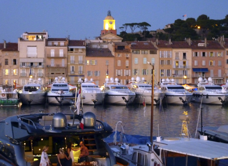 Docked luxury yachts are seen in Saint-Tropez harbour on the French Riviera.