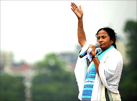 West Bengal Chief Minister Mamata Banerjee addresses her supporters during a rally in Kolkata.