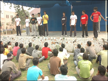 Prisoners take part in a dance program at Tihar jail.