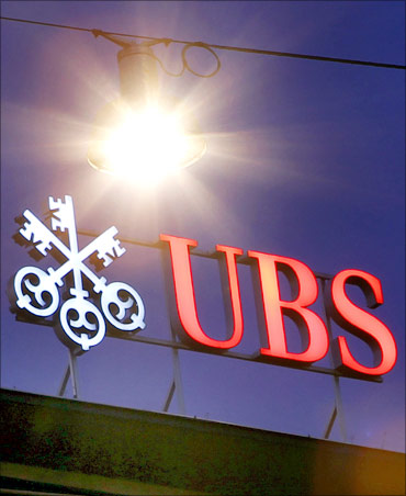 The logo of Swiss Bank UBS is pictured on the roof of the company's headquarters in Zurich.