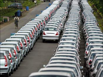 Cars lined up at a car manufacturing unit.