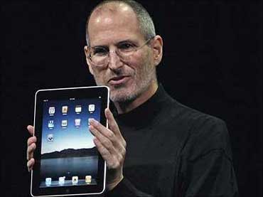 Steve Jobs with an iPad.