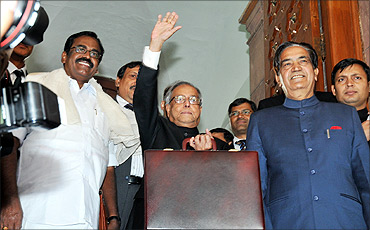 Pranab Mukherjee with Ministers of State of Finance, SS Palanimanickam and Namo Narain Meena.