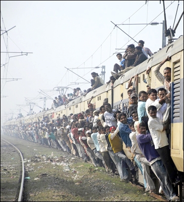 Passengers travel in an overcrowded train in the eastern Indian city of Patna.