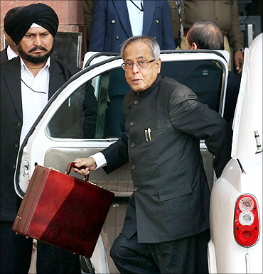 Finance Minister Pranab Mukherjee arrives at his office before presenting the Budget.