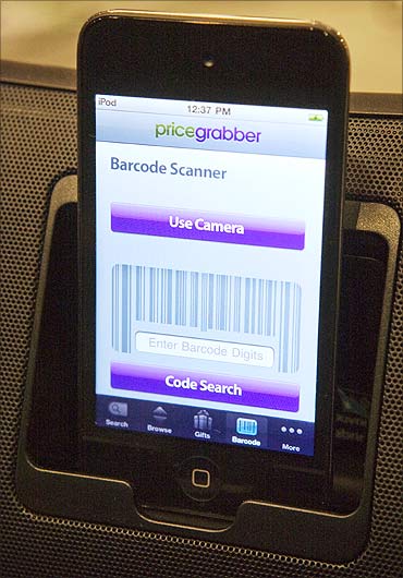 An iPod with a PriceGrabber mobile application is set on display.
