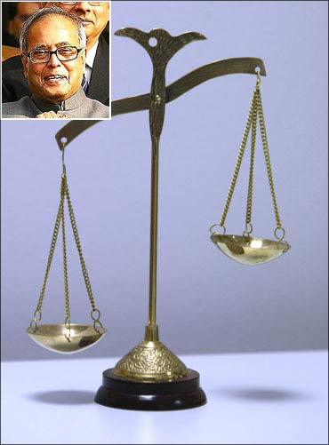 (Inset) Finance Minister Pranab Mukherjee.