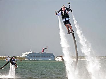 Scott Oosting (L) and Dave Tuxbury (R) go airborne with jetpacks.