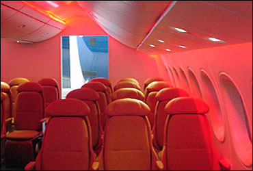 Interior photo showing windows and LED mood lighting options for the 787 Dreamliner.