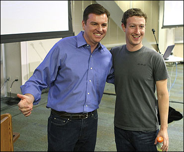 Skype CEO Tony Bates (L) and Facebook CEO Mark Zuckerberg.