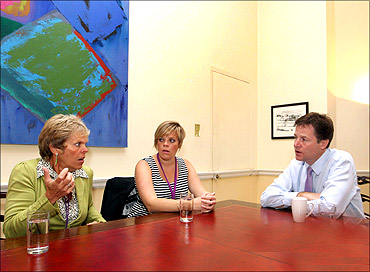 Britain's Deputy Prime Minister Nick Clegg (R) meets members of the 'Hacked Off' group.