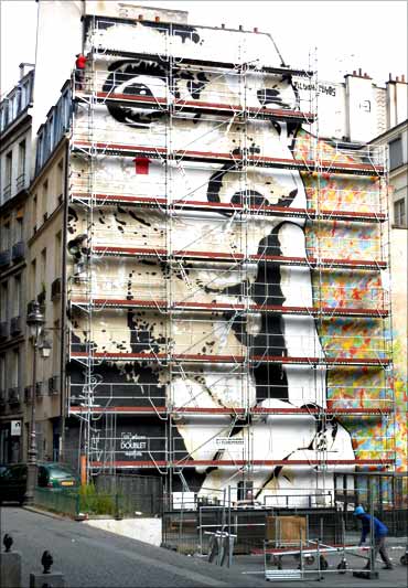 The giant wall stencil by French street artist Jef Aerosol which appears on a six-story building in central Paris.
