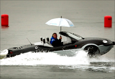 Richard Branson in an amphibious car.