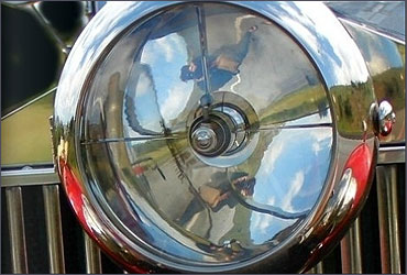 The searchlight fitted to the front of the car.